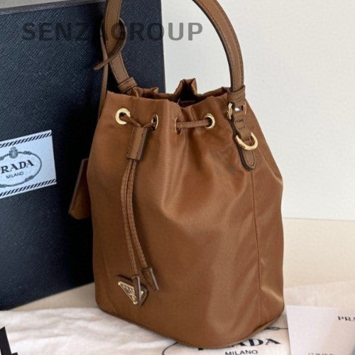 Prada Re-EditionRe-Nylon Mini Bucket Top Handle Bag Crossbody Brown Gold Women