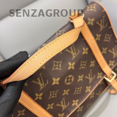 Louis Vuitton Monogram Transformer Large Backpack Brown Gold Buckle Unisex