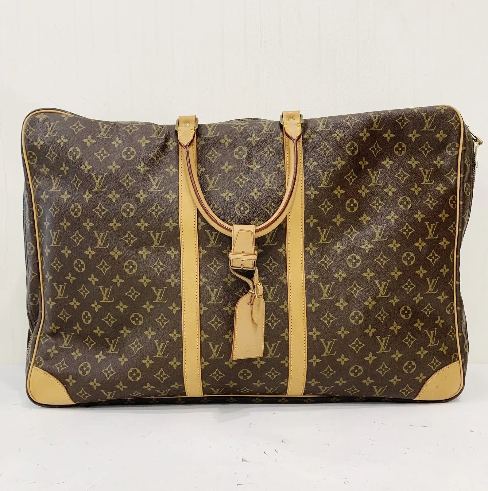 Louis Vuitton Sirius Monogram Handbag Brown Gold Unisex Adults Classic