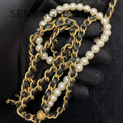 Chanel 21K Black Gold Quilted Camera Bag with Pearl Chain Strap
