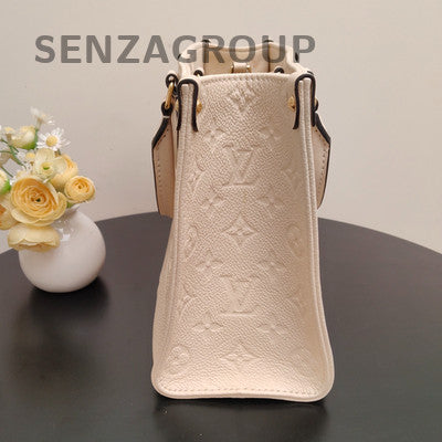 Louis Vuitton Onthego Monogram Empreinte Leather Tote Bag - White