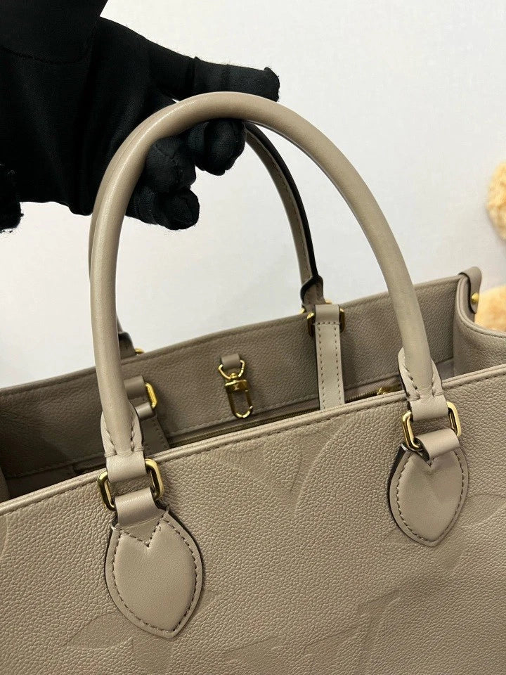 Louis Vuitton Embossed Leather MM OnTheGo Tote Bag For Women