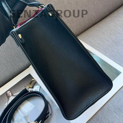 Louis Vuitton OnTheGo PM Tote Bag in Black & White Leather - Women's Fashion