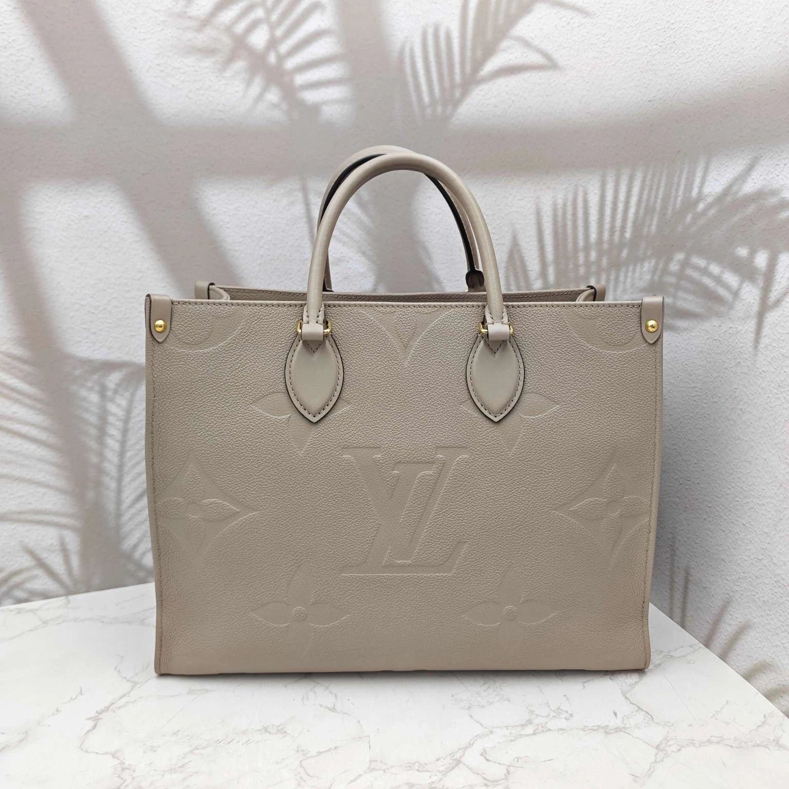 Louis Vuitton Grainy Calfskin Onthego Medium Tote Bag For Women