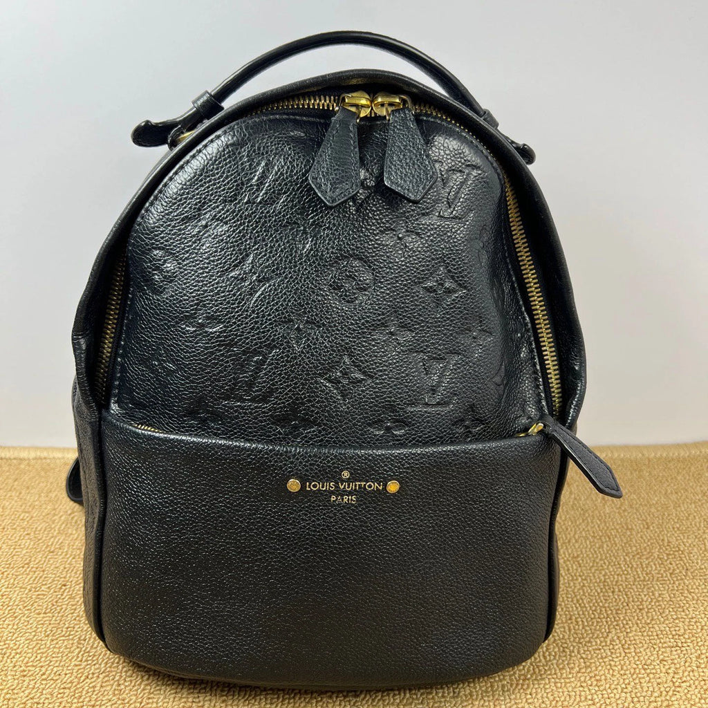 Louis Vuitton Sorbonne Monogram Empreinte Calfskin Backpack Black Gold Unisex