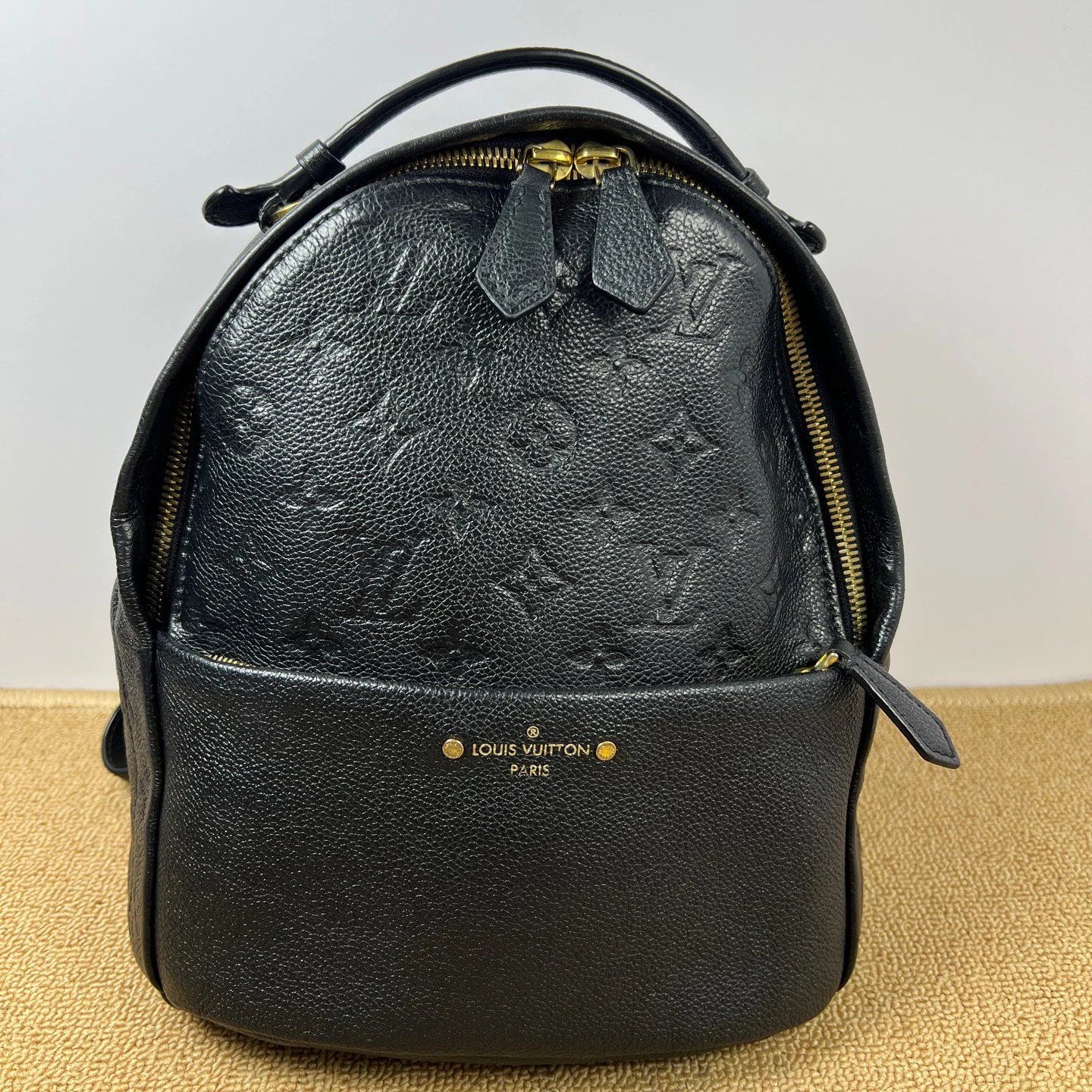 Louis Vuitton Sorbonne Monogram Empreinte Calfskin Backpack Black Gold Unisex