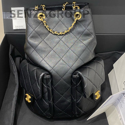 Chanel 25C Black Gold Drawstring Bucket Backpack Quilted Lambskin Classic