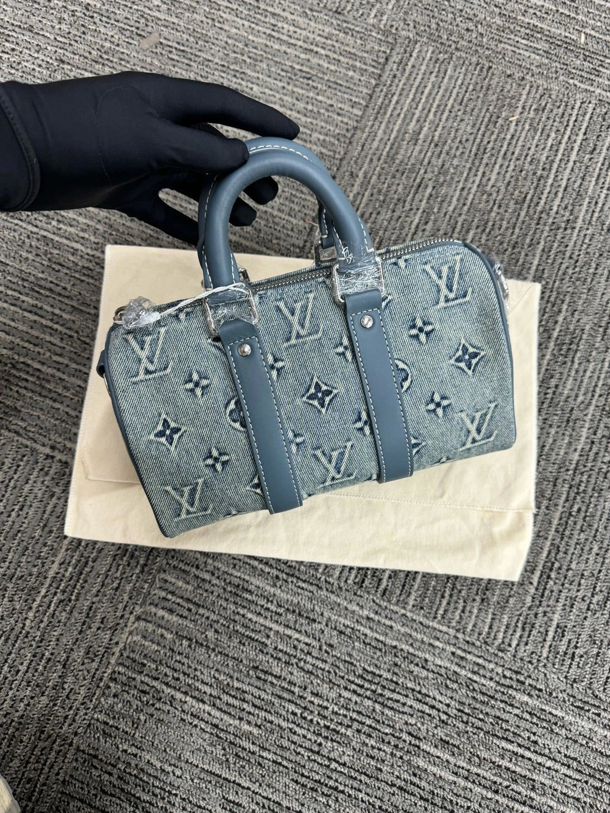 Louis Vuitton Keepall 25 Denim Logo Handbag For Women
