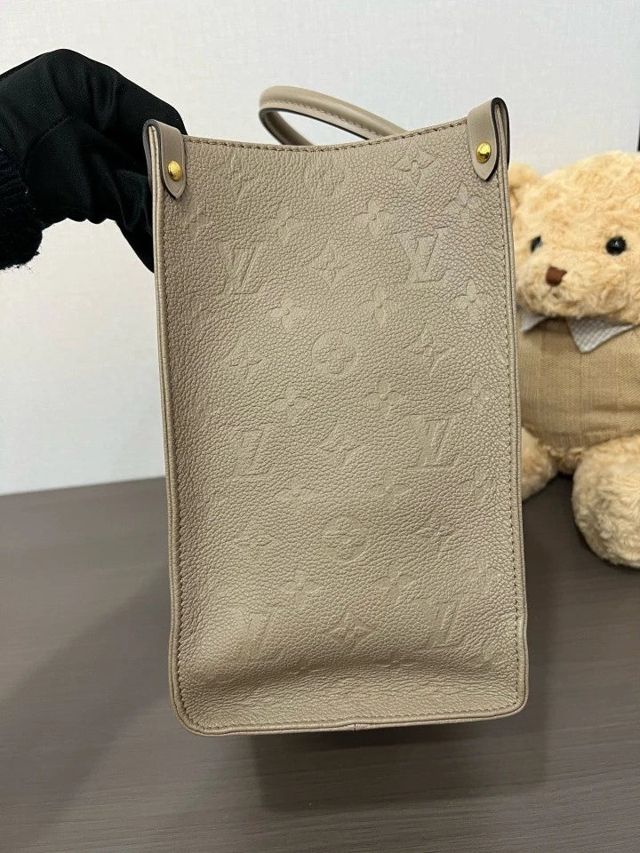 Louis Vuitton Embossed Leather MM OnTheGo Tote Bag For Women
