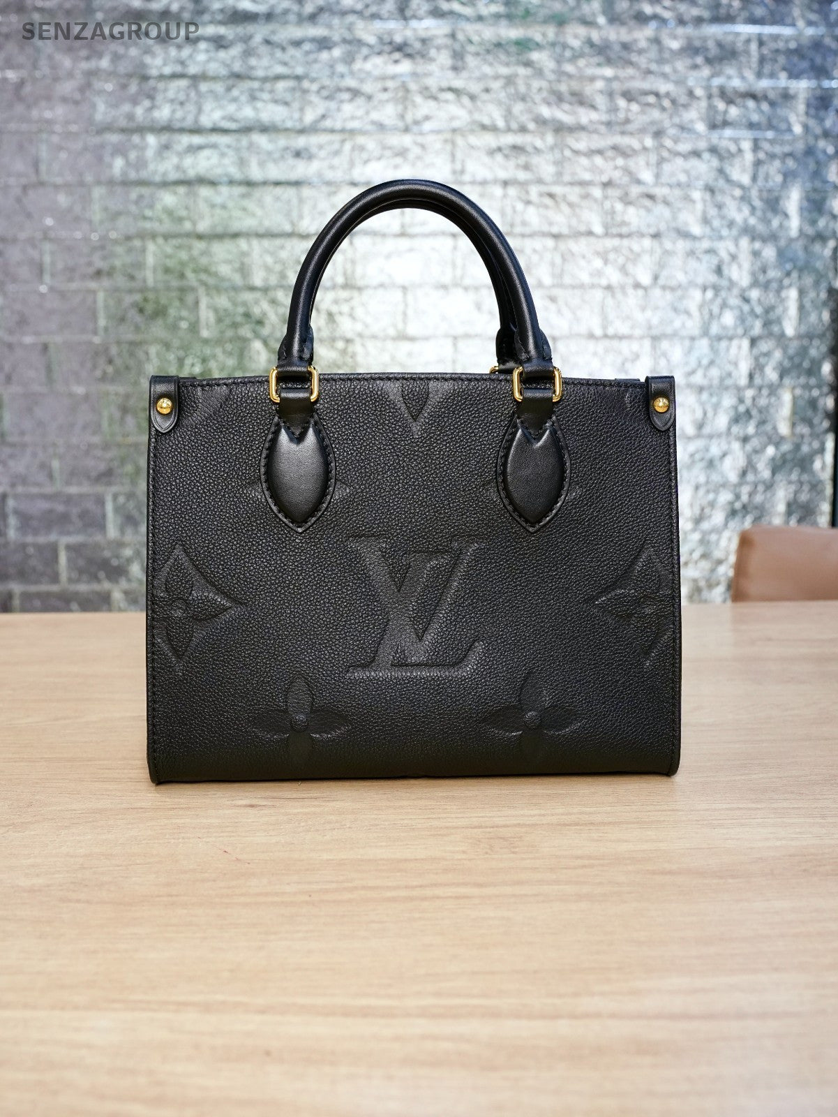 LOUIS VUITTON black Monogram Empriente ON THE GO PM almost brand new
