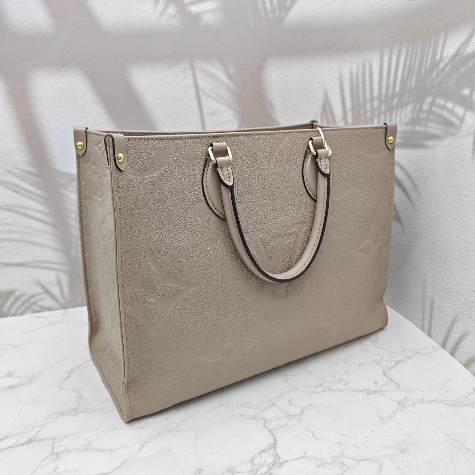 Louis Vuitton Grainy Calfskin Onthego Medium Tote Bag For Women