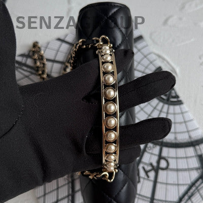 Chanel 24S Pearl Handle WOC Black Gold Chain Crossbody Bag Classic