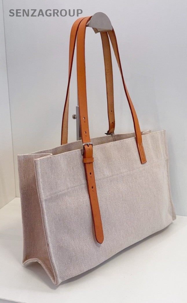 Hermes Etriviere Tote Beige Canvas with golden-brown leather shoulder strap