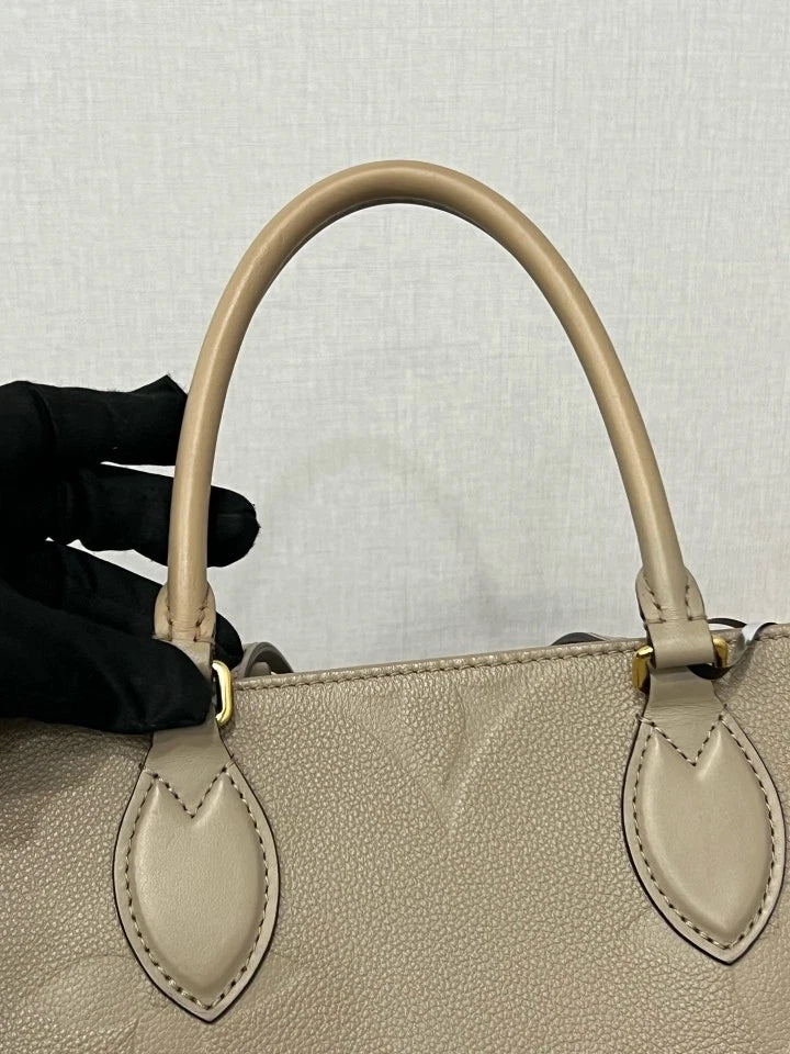 Louis Vuitton Embossed Medium On The Go Tote Bag For Women
