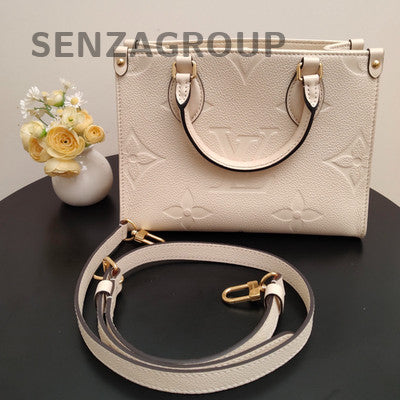 Louis Vuitton Onthego Monogram Empreinte Leather Tote Bag - White