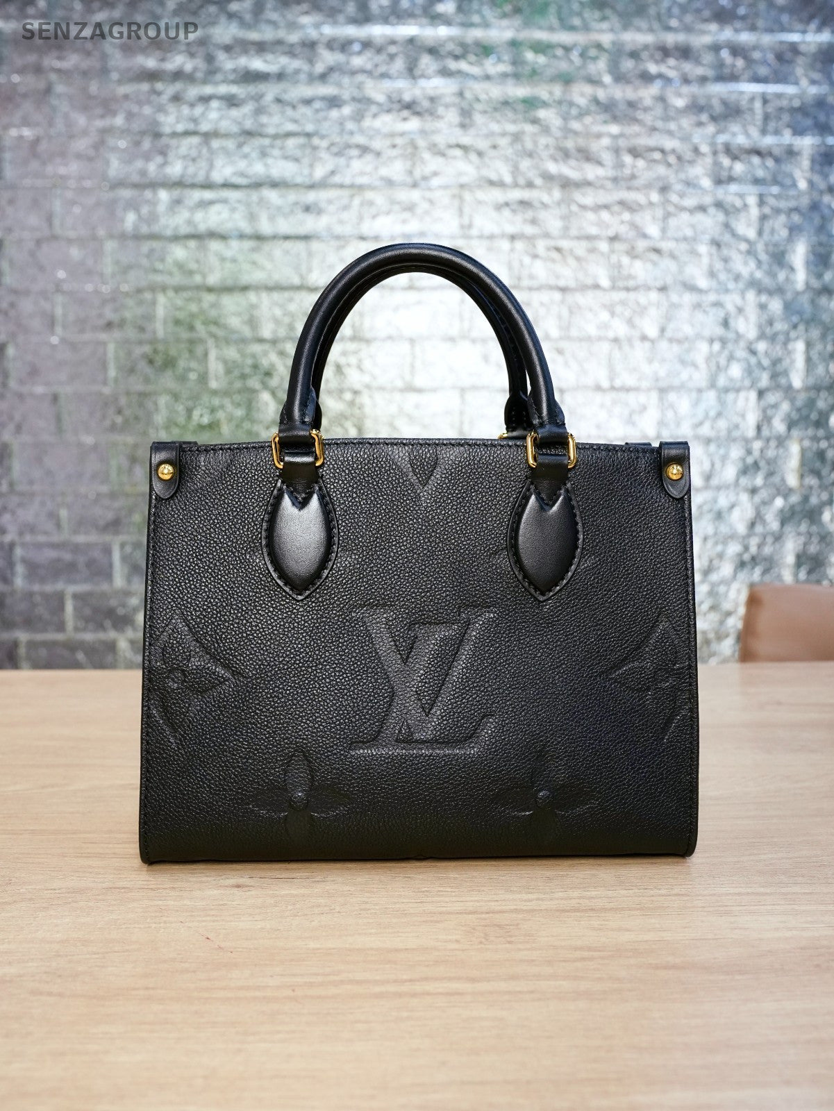LOUIS VUITTON black Monogram Empriente ON THE GO PM almost brand new