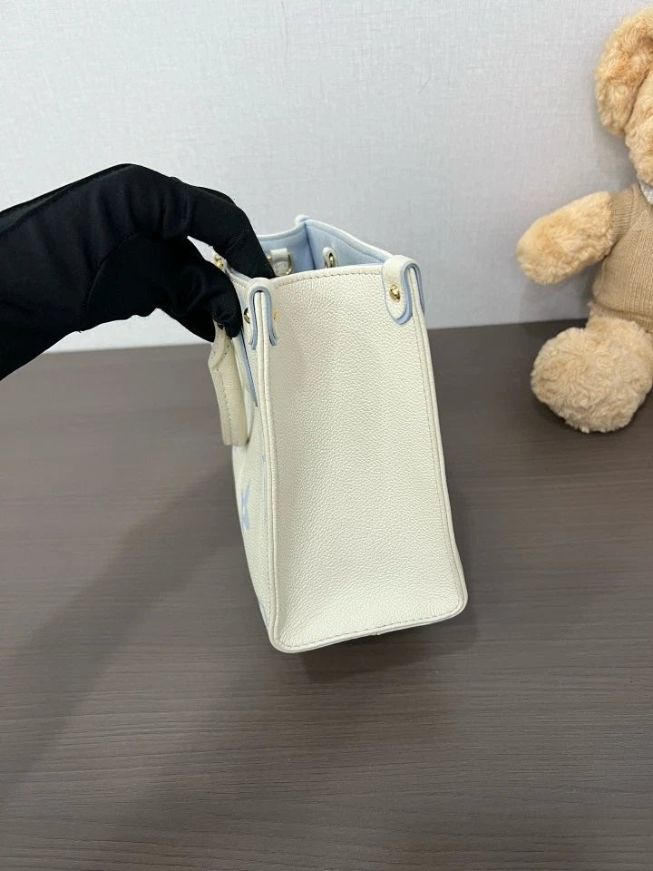 Louis Vuitton OnTheGo PM Empreinte Leather Tote Bag For Women